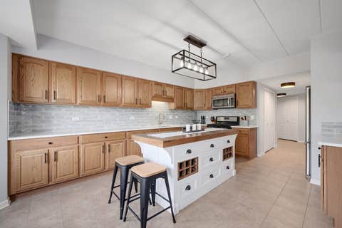 Tiny photo for 8505 Woodward Avenue #102, Woodridge, IL 60517 (MLS # 12655842)