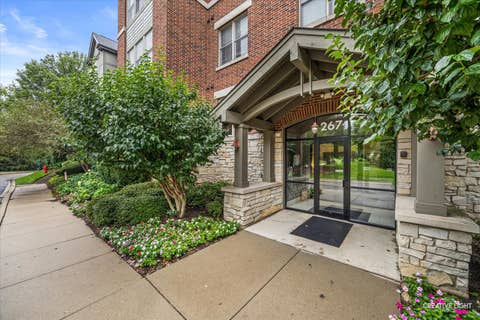 Photo of 267 E RAILROAD Avenue #104, Bartlett, IL 60103 (MLS # 12732366)