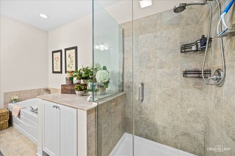 Tiny photo for 267 E RAILROAD Avenue #104, Bartlett, IL 60103 (MLS # 12732366)