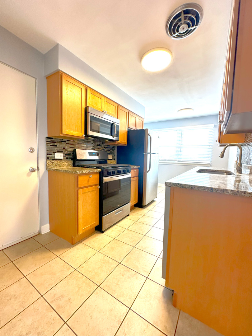 6945 W Belmont Avenue