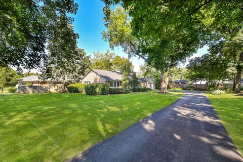 Photo of 611 Polo Drive, Wheaton, IL 60187 (MLS # 12490185)