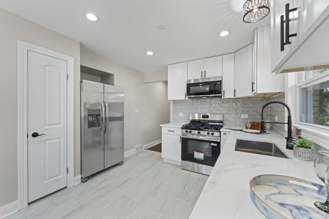 Tiny photo for 95 Erie Street, Maywood, IL 60153 (MLS # 12774946)