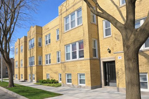 Photo of 4012 W Ainslie Street #G, Chicago, IL 60630 (MLS # 12579841)