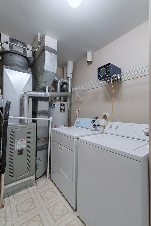 Tiny photo for 2244 S LINCOLN Street #312, Lombard, IL 60148 (MLS # 12508441)