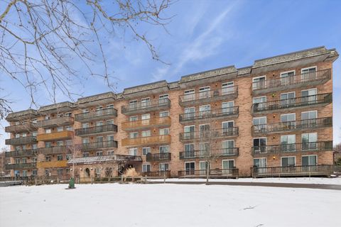 Photo of 8025 Woodglen Lane #303, Downers Grove, IL 60516 (MLS # 12550435)