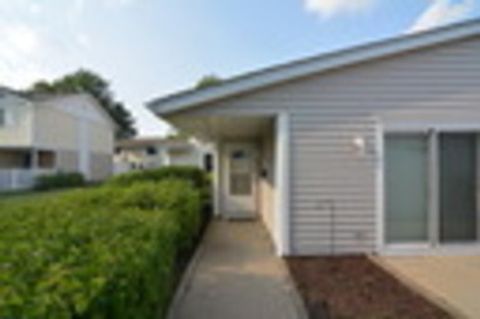 Photo of 210 N Waterford Drive #210, Schaumburg, IL 60194 (MLS # 12522859)