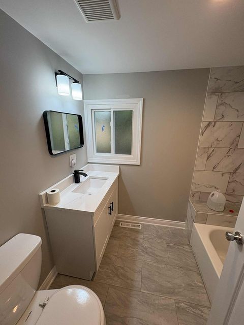 Tiny photo for 36 E 151st Street, Harvey, IL 60426 (MLS # 12474378)