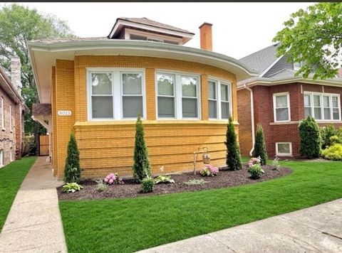 Photo of 8015 S Paxton Avenue, Chicago, IL 60617 (MLS # 12633150)