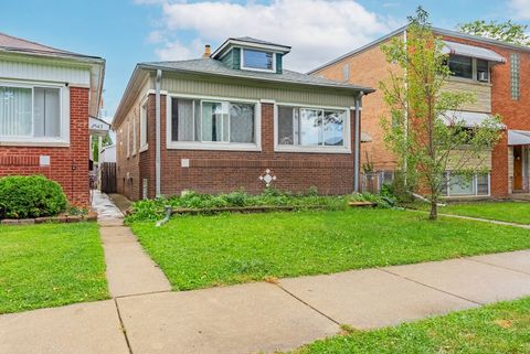 Photo of 2541 N Mont Clare Avenue, Chicago, IL 60707 (MLS # 12486077)