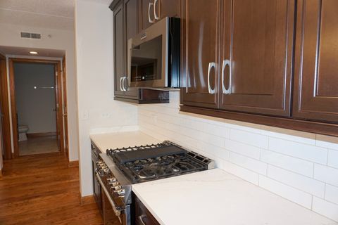 Tiny photo for 4811 N OLCOTT Avenue #516, Harwood Heights, IL 60706 (MLS # 12606145)