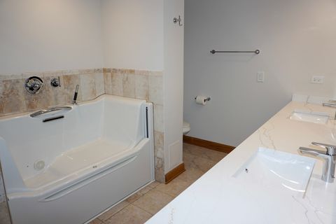 Tiny photo for 4811 N OLCOTT Avenue #516, Harwood Heights, IL 60706 (MLS # 12606145)