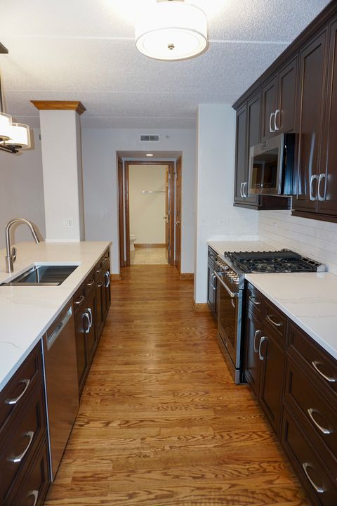 Tiny photo for 4811 N OLCOTT Avenue #516, Harwood Heights, IL 60706 (MLS # 12606145)