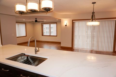 Tiny photo for 4811 N OLCOTT Avenue #516, Harwood Heights, IL 60706 (MLS # 12606145)