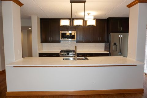 Tiny photo for 4811 N OLCOTT Avenue #516, Harwood Heights, IL 60706 (MLS # 12606145)