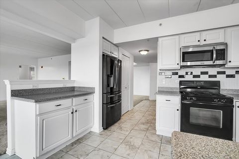 Tiny photo for 8515 Woodward Avenue #303, Woodridge, IL 60517 (MLS # 12535248)