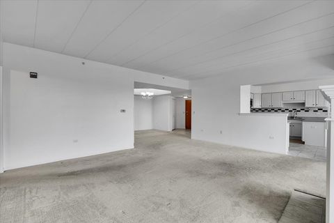 Tiny photo for 8515 Woodward Avenue #303, Woodridge, IL 60517 (MLS # 12535248)