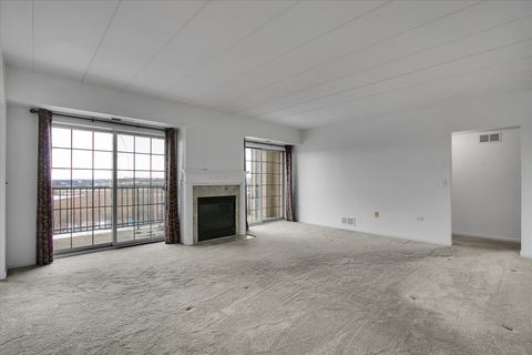 Tiny photo for 8515 Woodward Avenue #303, Woodridge, IL 60517 (MLS # 12535248)