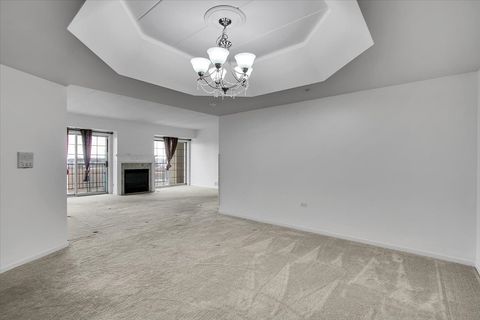 Tiny photo for 8515 Woodward Avenue #303, Woodridge, IL 60517 (MLS # 12535248)