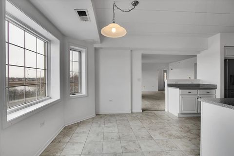 Tiny photo for 8515 Woodward Avenue #303, Woodridge, IL 60517 (MLS # 12535248)