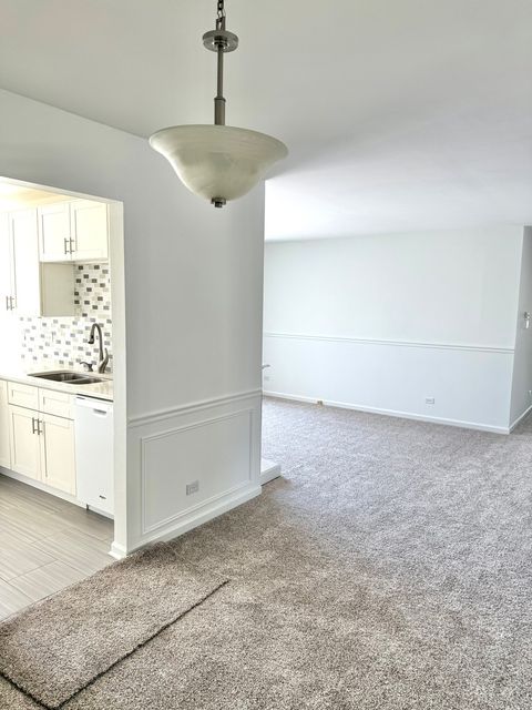 Tiny photo for 327 WILDBERRY Court #D2, Schaumburg, IL 60193 (MLS # 12474607)