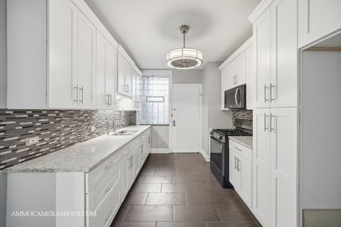Tiny photo for 6807 S Paxton Avenue #1, Chicago, IL 60649 (MLS # 12513628)