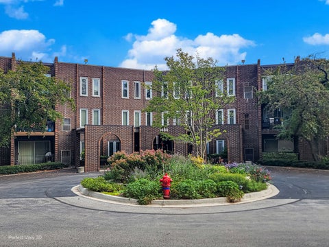 Photo of 1430 Sandstone Drive #316, Wheeling, IL 60090 (MLS # 12765122)