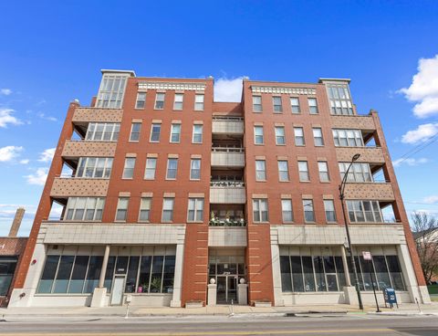 Photo of 2700 W BELMONT Avenue #402, Chicago, IL 60618 (MLS # 12617732)
