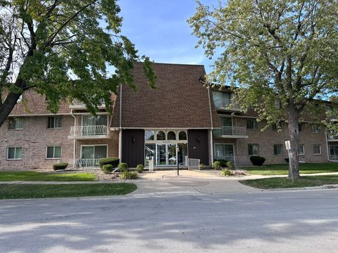 Photo of 3240 N Manor Drive #130, Lansing, IL 60438 (MLS # 12461393)