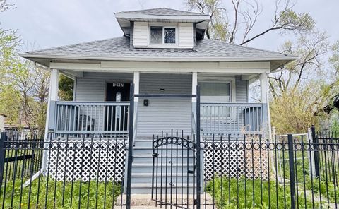 Photo of 10117 S Perry Avenue, Chicago, IL 60628 (MLS # 12481197)