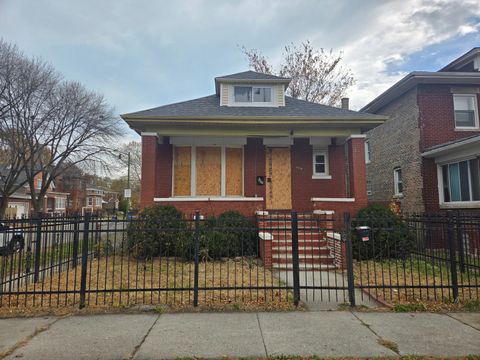 Photo of 7135 S WOODLAWN Avenue, Chicago, IL 60619 (MLS # 12519570)