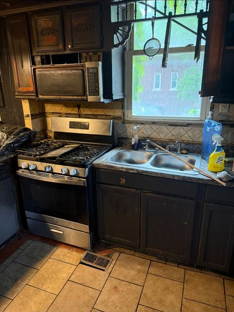 Tiny photo for 7135 S WOODLAWN Avenue, Chicago, IL 60619 (MLS # 12519570)