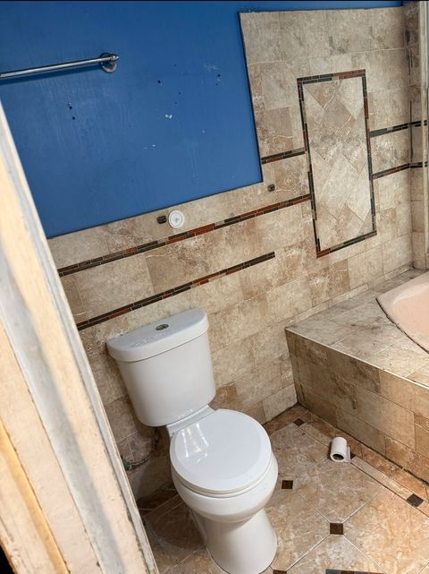 Tiny photo for 7135 S WOODLAWN Avenue, Chicago, IL 60619 (MLS # 12519570)