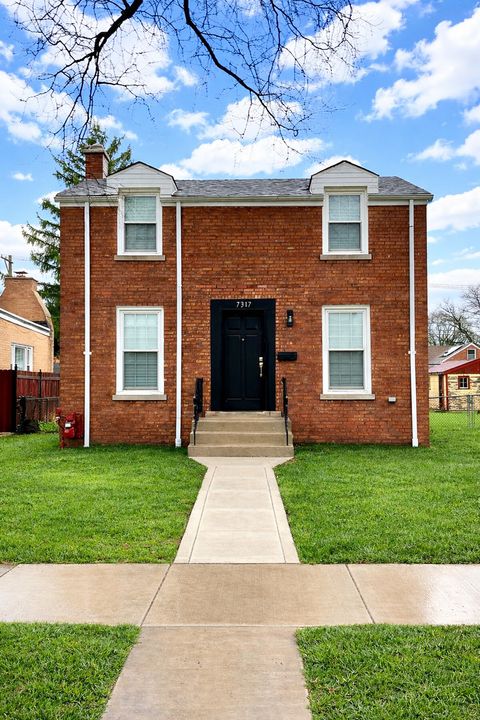 Photo of 7317 S Mozart Street, Chicago, IL 60629 (MLS # 12613848)