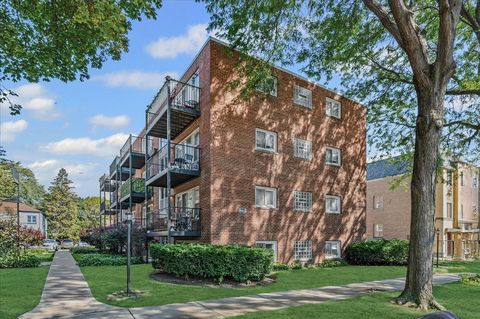 Photo of 2620 W Catalpa Avenue #1A, Chicago, IL 60625 (MLS # 12492470)