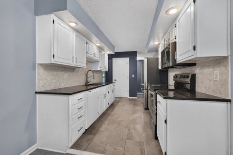Tiny photo for 6401 Utica Ridge Road #12, Davenport, IA 52807 (MLS # 12683376)