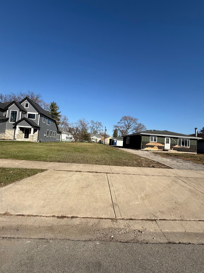From street with driveway cut