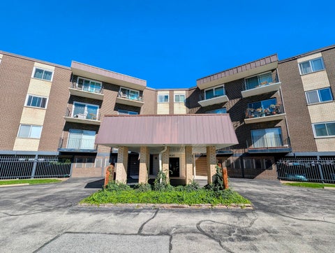 Photo of 9820 S Pulaski Road #106, Oak Lawn, IL 60453 (MLS # 12776950)