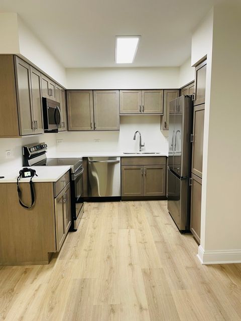 Tiny photo for 1777 Dewes Street #E, Glenview, IL 60025 (MLS # 12560595)