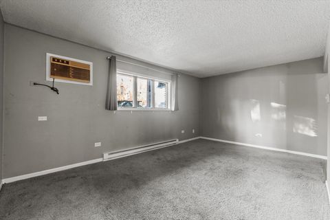 Tiny photo for 218 Madison Street #1C, Joliet, IL 60435 (MLS # 12534463)
