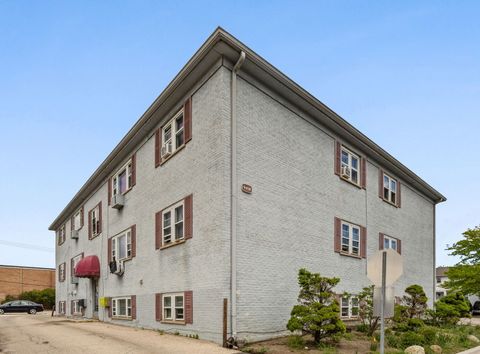 Photo of 9458 Kelvin Lane #103, Schiller Park, IL 60176 (MLS # 12647524)