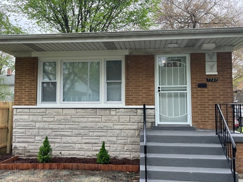 Photo of 7737 S Champlain Avenue, Chicago, IL 60619 (MLS # 12666926)