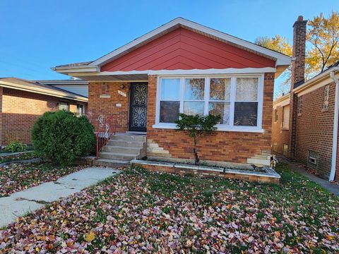 Photo of 657 E 100th Place, Chicago, IL 60628 (MLS # 12531127)