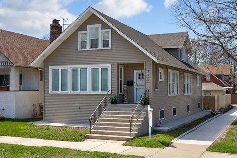 Photo of 7700 S Paxton Avenue, Chicago, IL 60649 (MLS # 12559634)