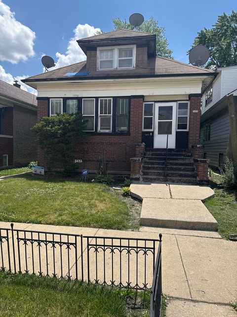 Photo of 5425 W Kamerling Avenue, Chicago, IL 60651 (MLS # 12528118)