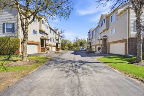 Photo of 304 Monarch Drive, Streamwood, IL 60107 (MLS # 12625762)