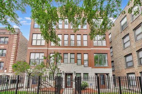 Photo of 4720 S Woodlawn Avenue #D, Chicago, IL 60615 (MLS # 12641730)