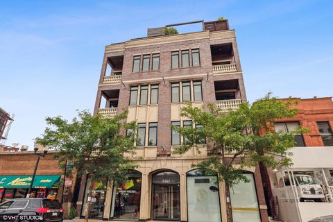Photo of 3161 N Halsted Street #202, Chicago, IL 60657 (MLS # 12568086)