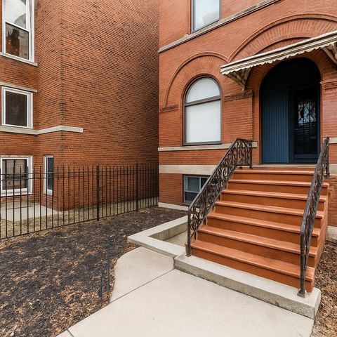 Photo of 928 E 46th Street, Chicago, IL 60653 (MLS # 12506434)