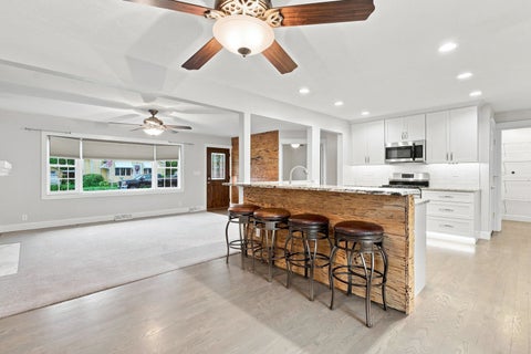 Tiny photo for 125 W. Orphed Street, Blue Grass, IA 52726 (MLS # 12721955)