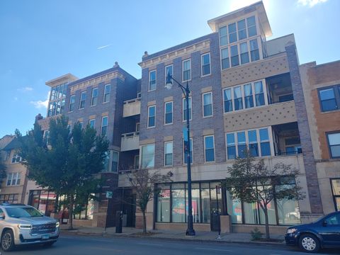 Photo of 3113 W Lawrence Avenue #A301, Chicago, IL 60625 (MLS # 12491717)
